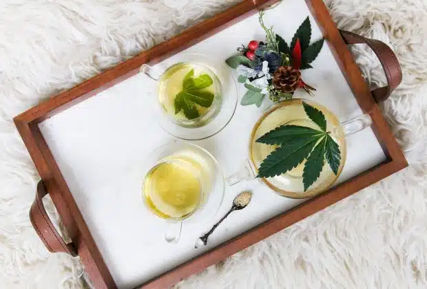 rectangular brown wooden tray filled with tea